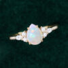 Classic Cluster Pear Shaped Opal Engagement Ring with Moissanite Accents (6)