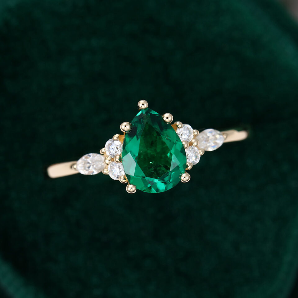 Vintage Pear Shaped Emerald Engagement Ring in Yellow Gold