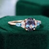 Oval Cut Rose Gold Alexandrite and Topaz Cluster Engagement Ring