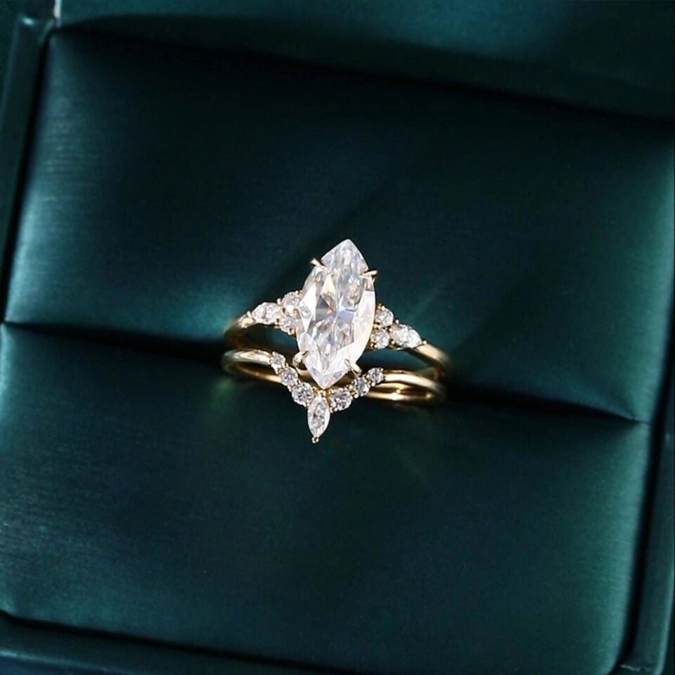 Yellow gold marquise moissanite engagement ring set
