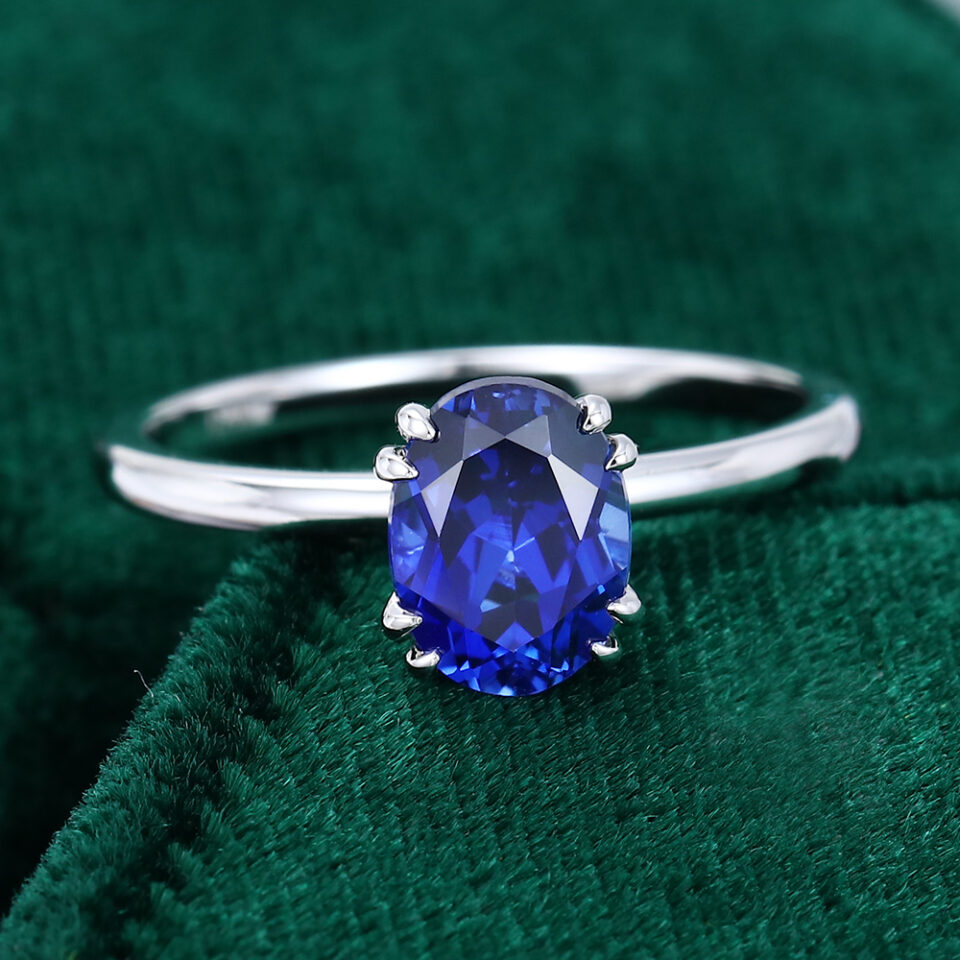 Double Claw Sapphire Solitaire Ring in White Gold