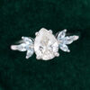White Gold Pear Moissanite Engagement Ring with Auamarine Side Stones