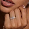 Round cut moissanite engagement ring white gold with gradient side stones