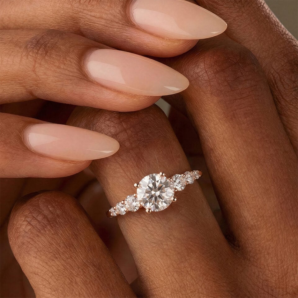Round cut moissanite engagement ring white gold with gradient side stones