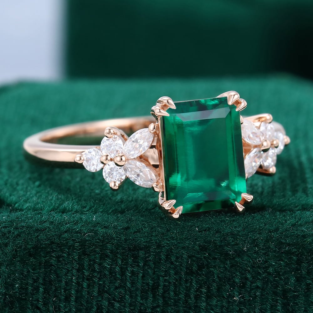 https://mollyjewelryus.com/wp-content/uploads/2022/10/Rose-Gold-Emerald-Cut-Emerald-Engagement-Ring-3.jpg?utm_source=chatgpt.com