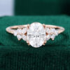Oval Cut Moissanite Blossom Engagement Ring with Double Claws in Rose Gold