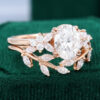 Oval Cut Moissanite Leaf Engagement Ring Set In 14K Rose Gold