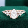 Pear Cut Moissanite Blossom Engagement Ring with Double Claws in Rose Gold