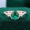 Pear Shaped Emerald & Diamond Engagement Ring with Blossom Cluster Accents (1)