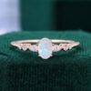 Oval Cut Natural Opal Rose Gold Engagement Ring with Trio Side Stones