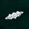 Snowdrift - Round Cut Moissanite Cluster Engagement Ring - half carat