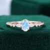 Rose gold oval cut moonstone dainty elegant engagement ring