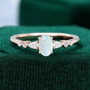oval cut opal engagement ring