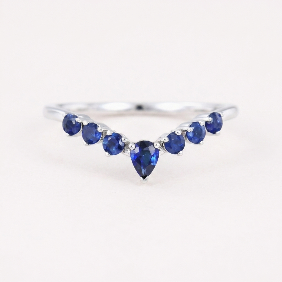 curved sapphire wedding band