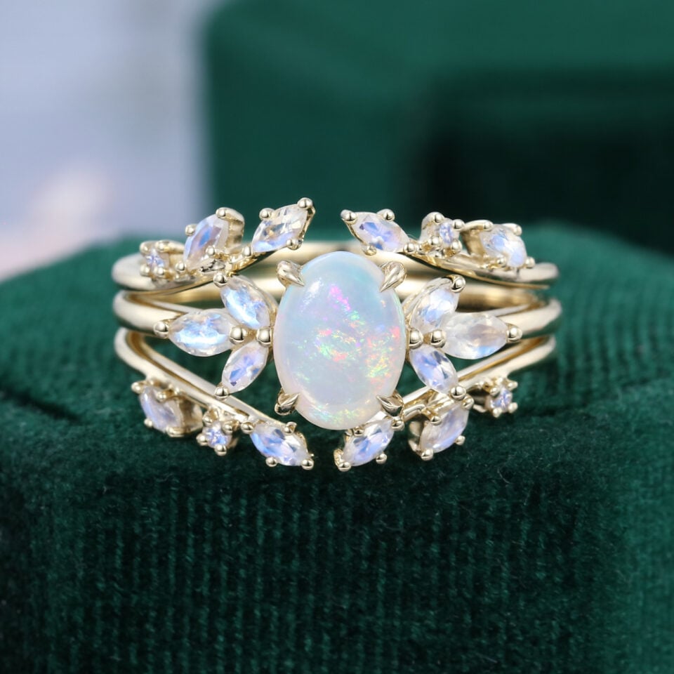 Open double bands oval cut opal with moonstone engagement ring set in yellow gold