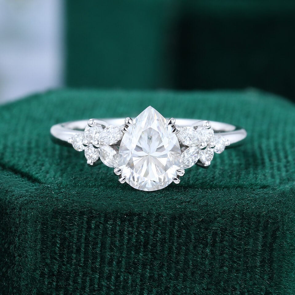 Pear Shape Moissanite Engagemnet Ring With Side Stones In White Gold (1)