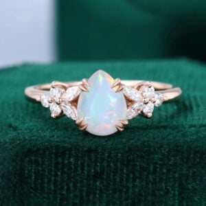 Pear Cut Ethiopian Natural Opal Engagement Ring with Moissanite Blossom