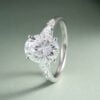 3 Carat Oval Cut Moissanite Engagement Ring With Trio Side Stones (2)