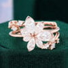 Pear Shaped Asymmetric Floral Cluster Moissanite Bridal Ring Set
