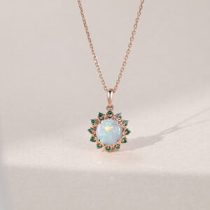 Cabochon Opal Pendant Necklace with Emerald Halo Accents