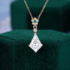 kite-cut-moissanite-emerald-flower-accented-pendant-necklace