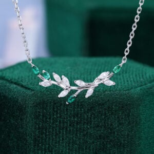 Nature inspired moissanite & emerald family tree necklace for women
