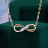 Moss agate & moissanite leaf accented infinity necklace