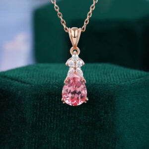 Pear cut pink sapphire pendant necklace moissanite accented