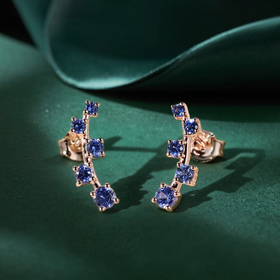 Graduated Round Cut Sapphire Stud Earrings
