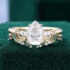 Pear Cut Moissanite Bridal Ring Set with Nature Inspired Leaf Band