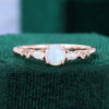 Asteria | Round Cut Natural Opal Dainty Engagement Ring with Trio Side Stones