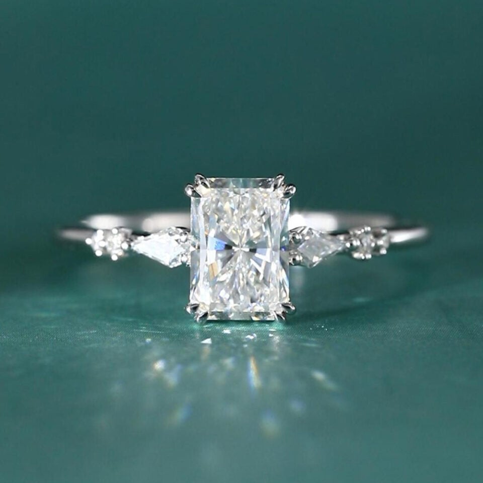 Radiant cut lab diamond engagement ring with trio side stones