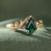 LeafLace Kite Cut Emerald Engagement Ring with Tanzanite Accents (1)
