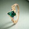 LeafLace Kite Cut Emerald Engagement Ring with Tanzanite Accents (3)