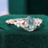Pear Cut Moss Agate Engagement Ring Twisted Band Moissanite Cluster Bridal Ring (2)