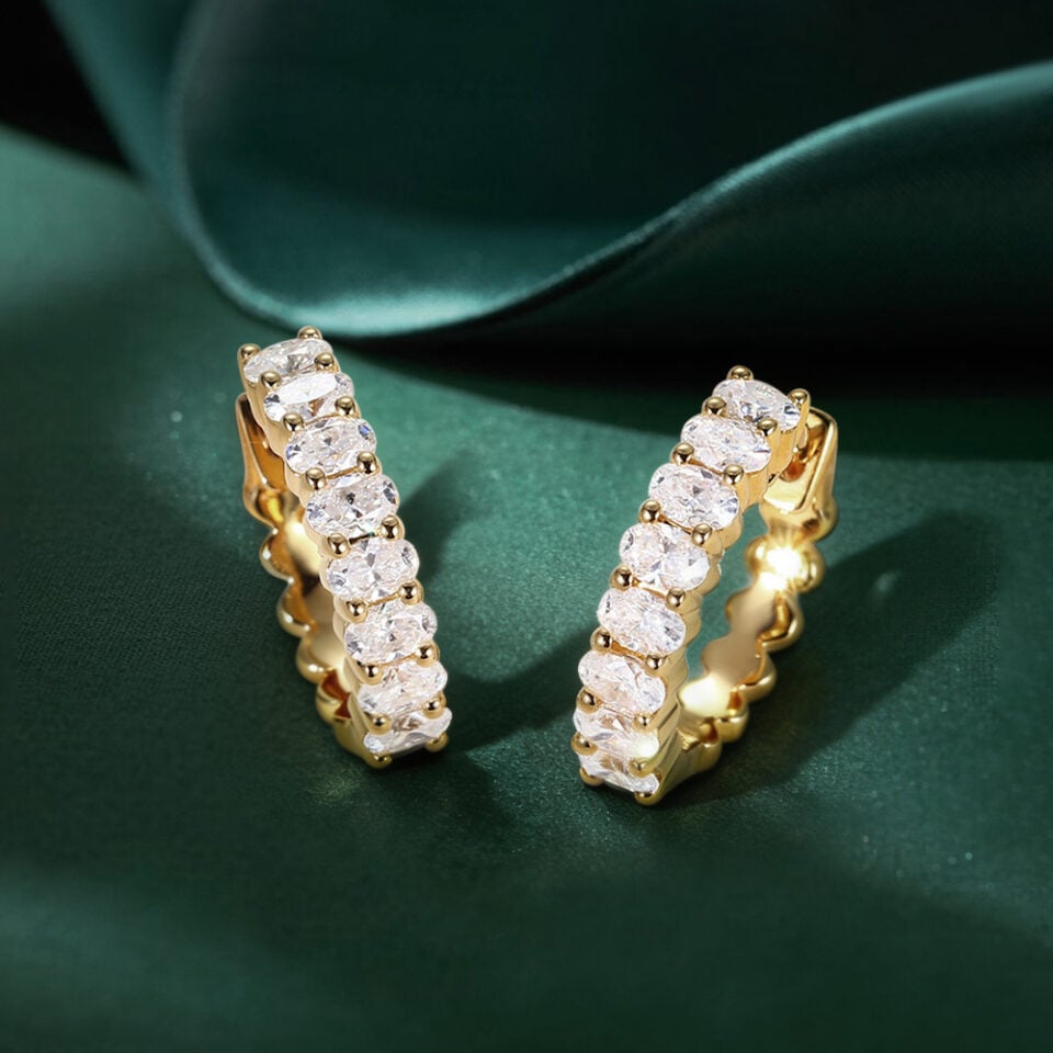 Shared Prong Oval Moissanite Huggie Hoop Earrings