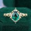 Pear Shaped Emerald Milgrain Crescent Halo Engagement Ring