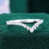 Round Cut Moissanite Curved Wedding Band With Tapered Pave Setting (5)