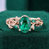 Garden Themed Oval Cut Emerald Engagement Ring With Flower & Leaf Accents