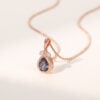Pear cut milgrain alexandrite pendant necklace fishtail diamond accented (4)
