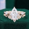 Marquise cut lab diamond bridal ring set with carved leaf band