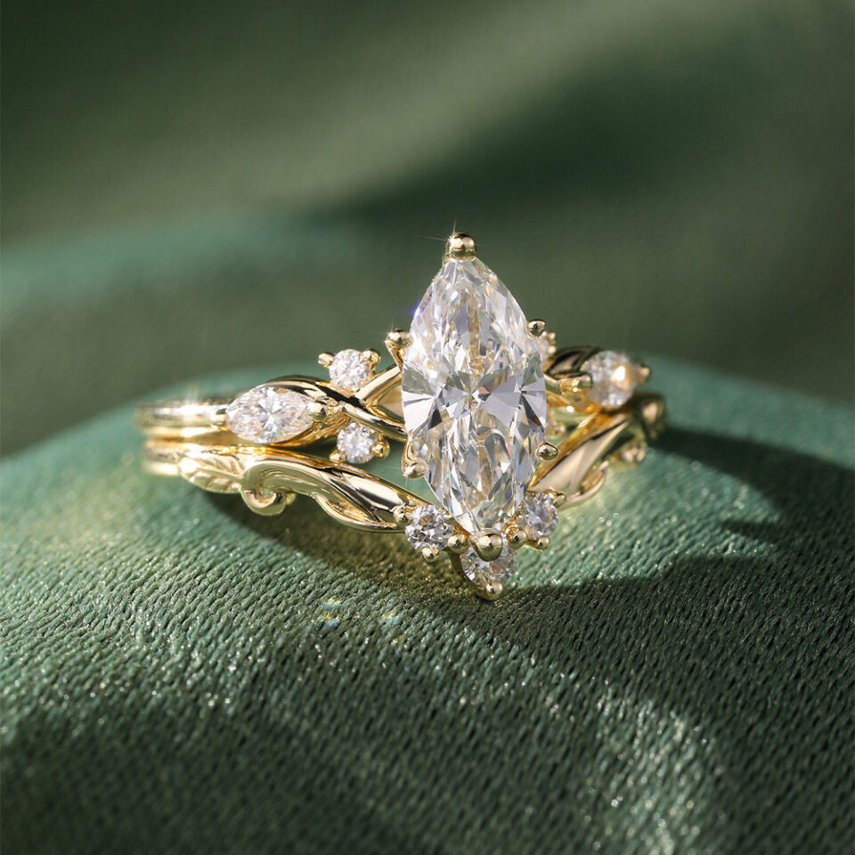 Marquise cut lab diamond bridal ring set with carved leaf band