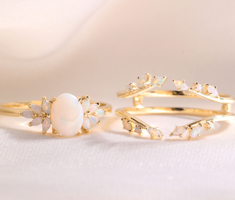 opal engagement ring with ring enhancer