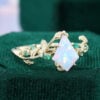 Kite Cut Lab Opal Engagement Ring With Emerald Accents (7)
