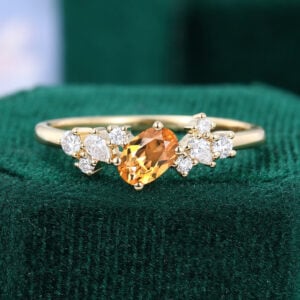 Leaning Oval Cut Citrine Engagement Ring With Moissanite Cluster Accents
