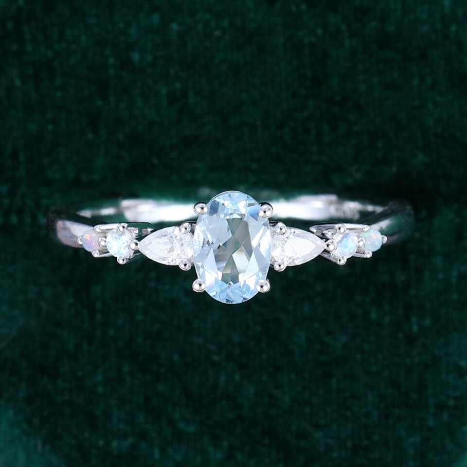 Oval Cut Aquamarine Dainty Engagement Ring With Trio Side Stones (2)