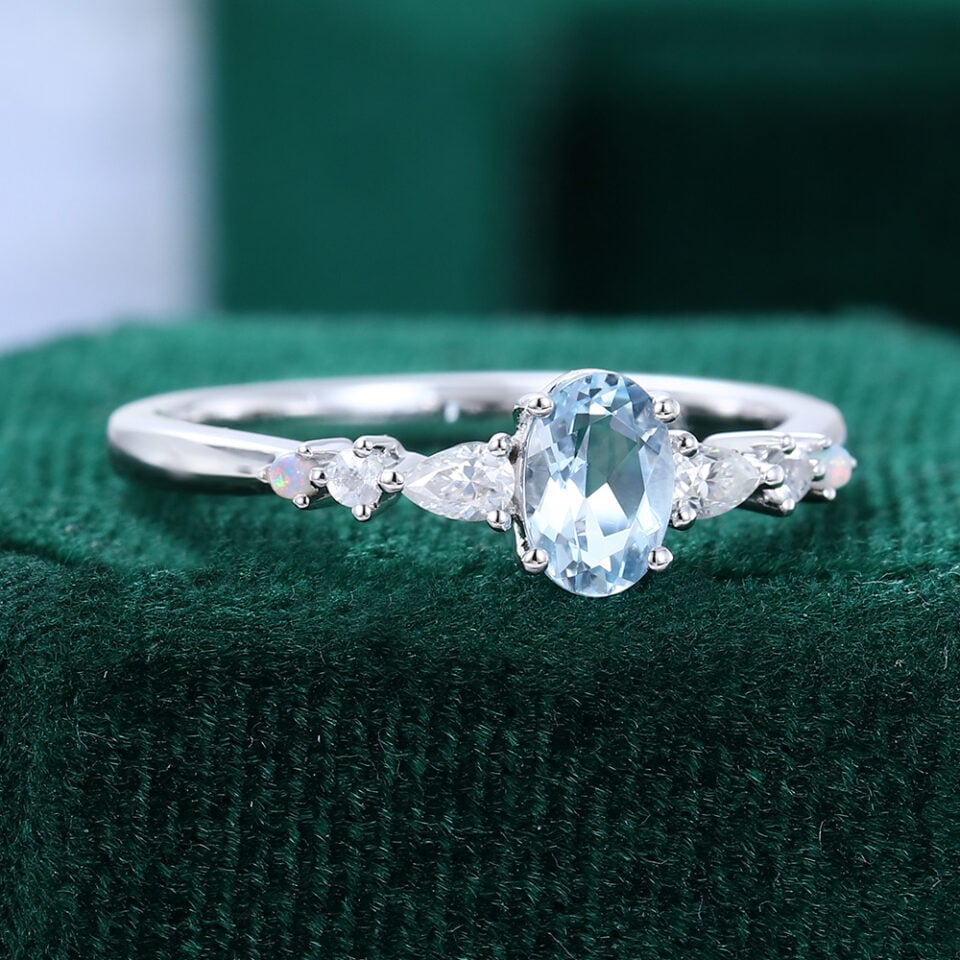 Oval Cut Aquamarine Dainty Engagement Ring With Trio Side Stones (3)