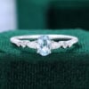Oval Cut Aquamarine Dainty Engagement Ring With Trio Side Stones (6)
