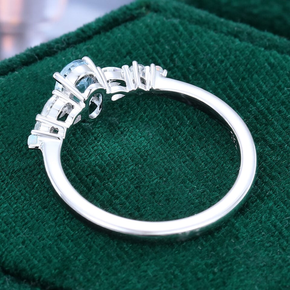 Oval Cut Aquamarine Dainty Engagement Ring With Trio Side Stones (7)