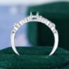 Oval Cut Emerald Engagement Ring With Interlock Crossover Band (13)